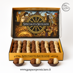 Baci di Dama Siciliani artigianali realizzati a mano dal maestro Gaspare Perniciaro, con frolla alla mandorla locale e farciture di crema nocciola cacao e crema bianca.