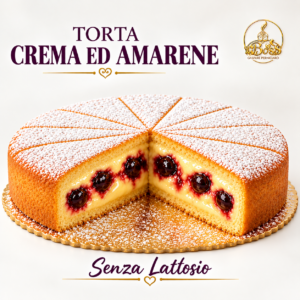 Torta Crema e Amarene Senza Lattosio di Il Boss Gaspare Perniciaro, con superficie dorata ricoperta di zucchero a velo e una sezione tagliata che mostra la crema vellutata e le amarene scure immerse nel loro succo.