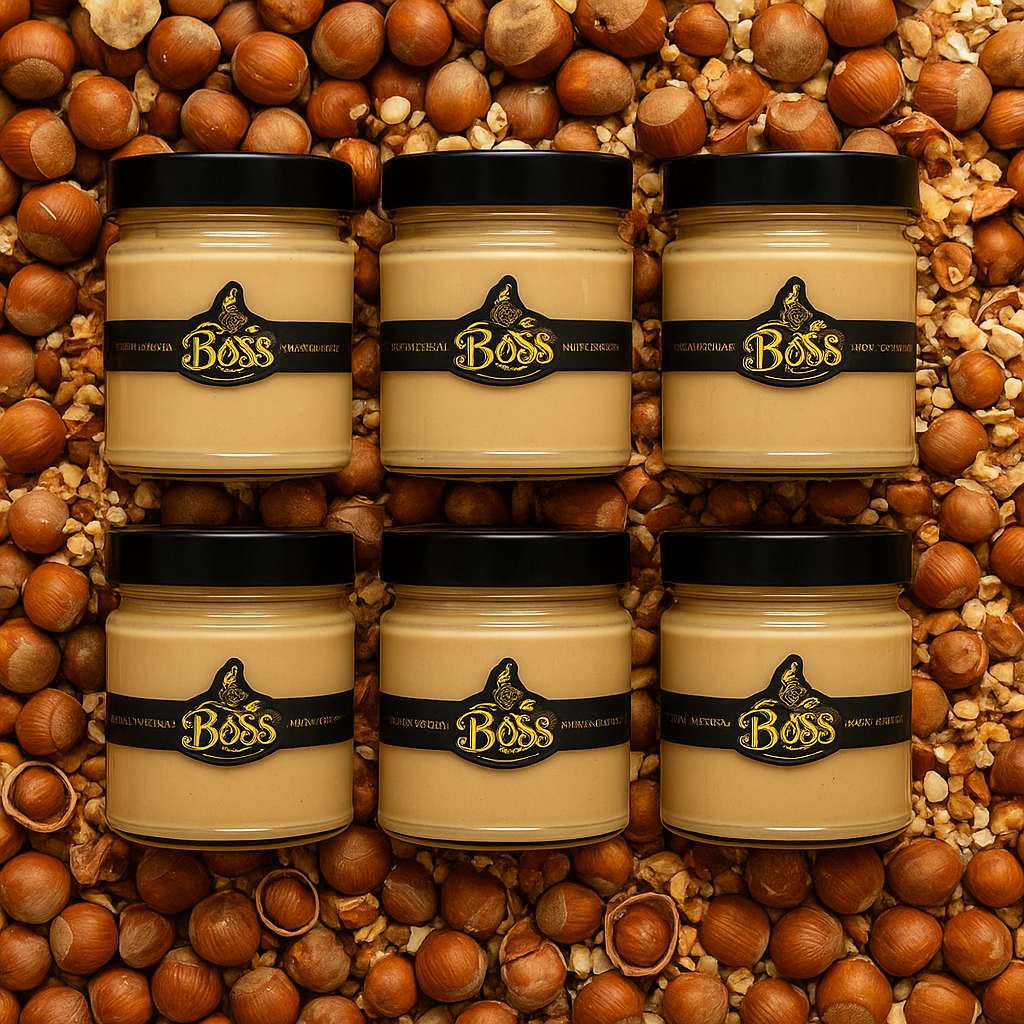 Crema nocciola siciliana artigianale in 6 vasetti su tavolo di legno con nocciole naturali